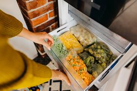 an image of a freezer filled with frozen veggies