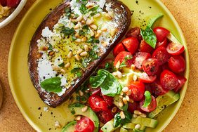 Open-Face goat cheese sandwich with tomato & avocado salad