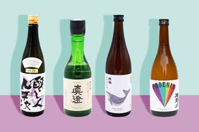 4 bottles of sake on a designed background