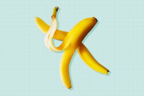 a yellow banana peel on a designed background
