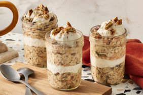 3 small mason jars filled with layered carrot cake overnight oats