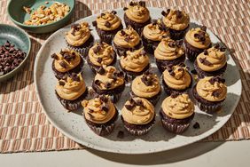 A plate of chocolate-peanut butter mini cupcakes
