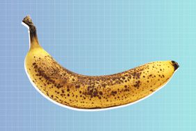 overripe banana on designed background