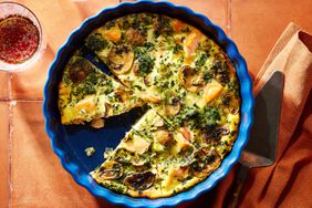 an image of the Crustless Salmon, Leek & Mushroom Quiche in a blue dish