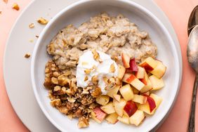 Overhead view of a white bowl of Oatmeal with Fruit & Nuts recipe