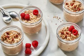 Side view of jars full of Cinnamon-Roll Overnight Oats recipe