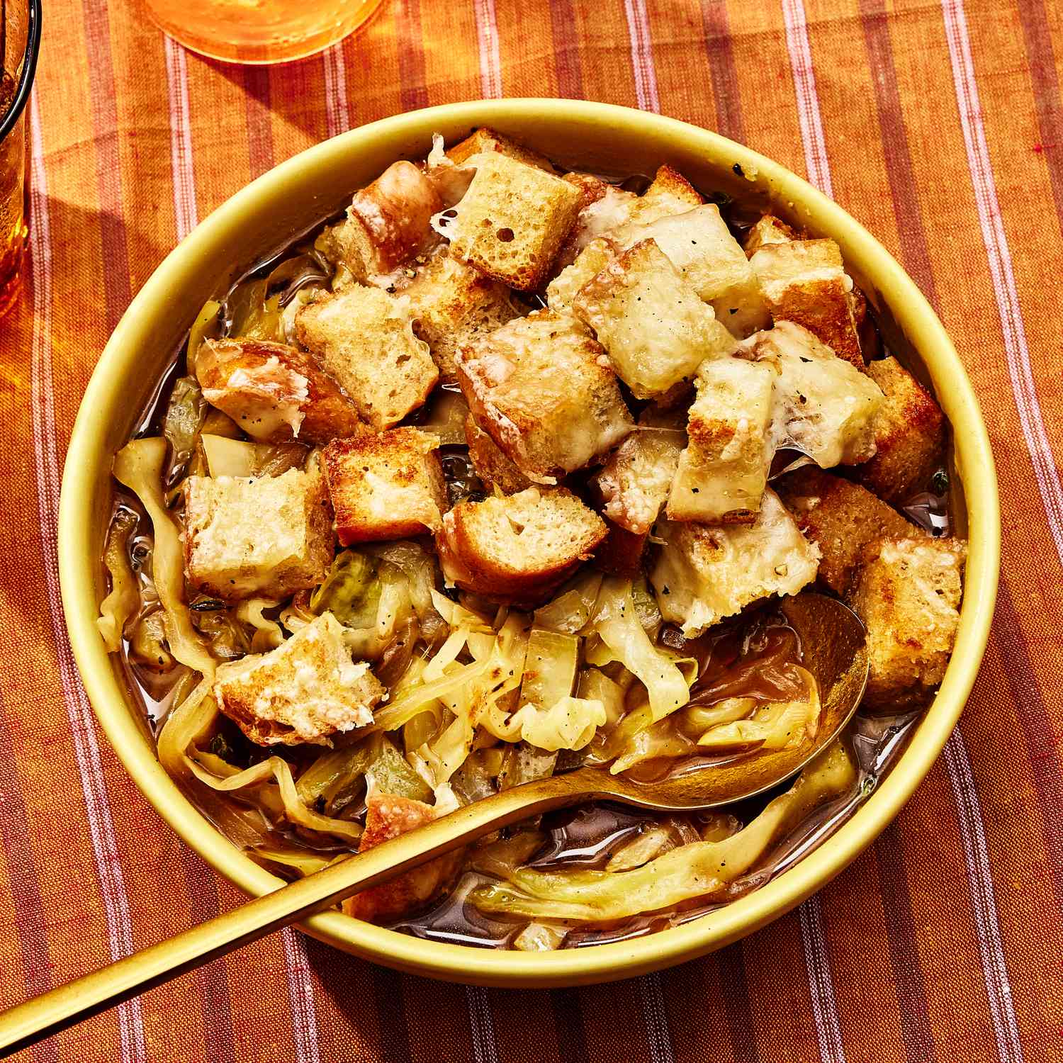 an image of the French Onion Cabbage Soup served in a bowl
