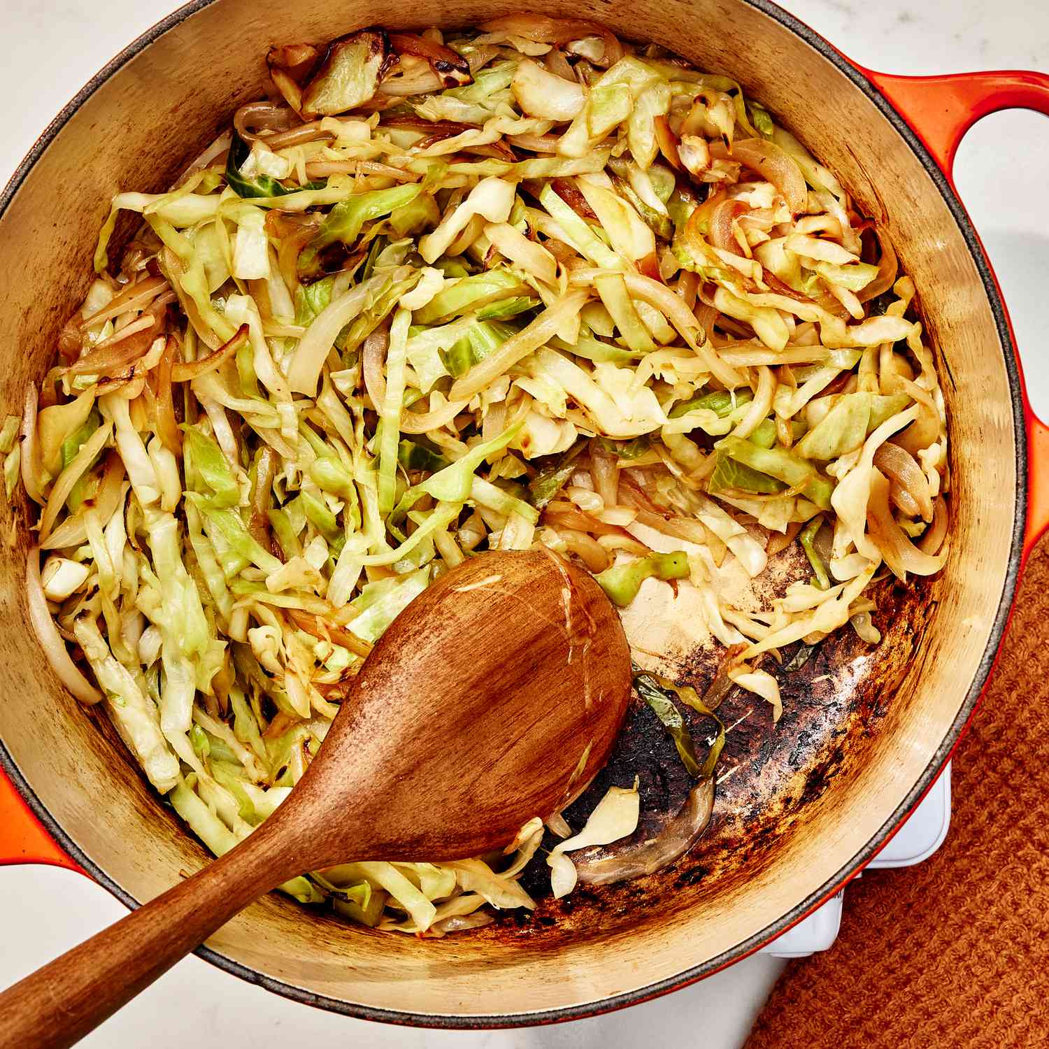 an image of the cabbage browning in the pan