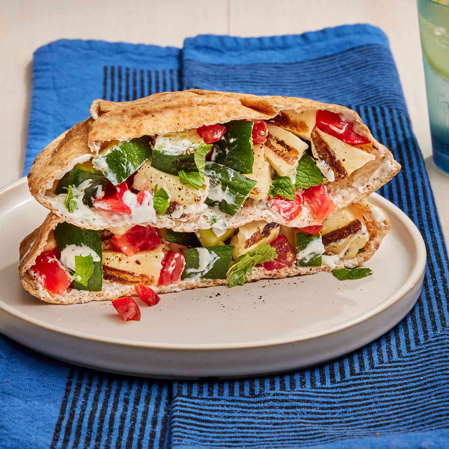 a recipe photo of the Grilled Zucchini & Halloumi Stuffed Pitas