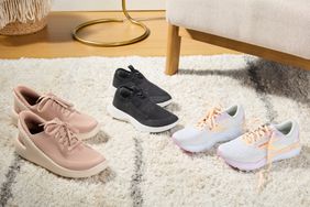 Three pairs of sneakers on carpet