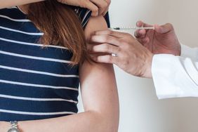 woman getting a flu shot
