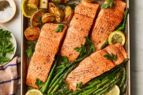 The Garlic Butter-Roasted Salmon with Potatoes & Asparagus recipe roasted on a sheet pan