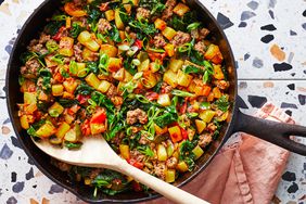 Overhead photo of Ground Beef & Potato skillet with spoon and linen. 