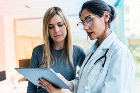 a doctor reviewing treatment options with a patient