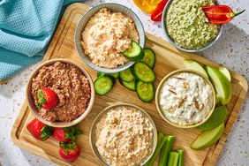 High-protein dips and dippers on a board