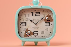 Alarm clock with poop emojis on it