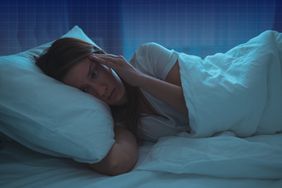 a photo of a woman struggling to sleep at night