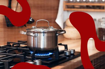 a photo of a pot of water boiling on a gas stove 