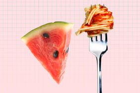 Slice of watermelon next to pasta on a fork