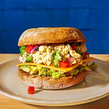 an image of the Veggie-Tofu Scramble & Cheese Breakfast Sandwich