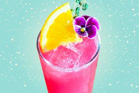 A cocktail on a designed background