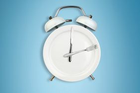 a photo clock looking like a place with a knife and fork 