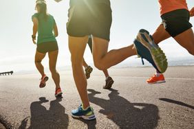 a photo of a group of people running together