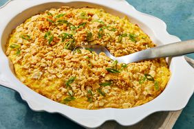 The scalloped corn recipe in a white baking pan