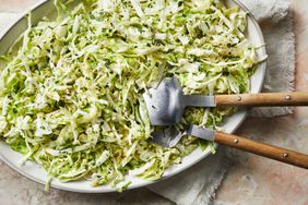 Simple Cabbage Salad in a serving bowl with utensils
