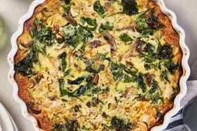 Overhead view of a baking dish of Spinach & Mushroom Quiche recipe
