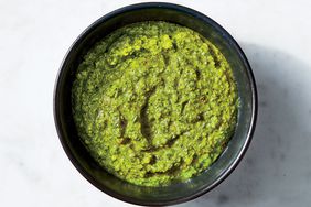 Spinach-Walnut Pesto in a black bowl