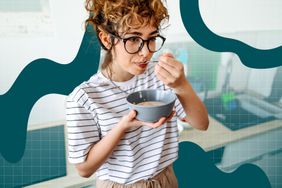 a photo of a woman eating cereal in the kitchen