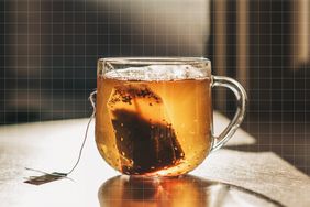 a photo of tea in a glass mug