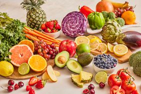 a still life of various fruits and vegetables