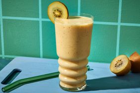 a photo of the Tropical Smoothie garnished with a kiwi slice