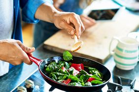 man cooking vegan food