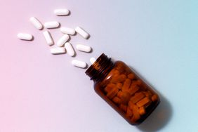 a photo of a bottle of calcium supplements pouring out of a bottle