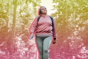 a photo of a woman walking in nature