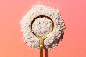 a photo of a powder supplement on a spoon