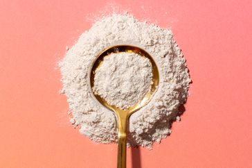 a photo of a powder supplement on a spoon