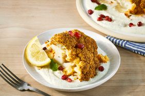 a recipe photo of the Whole Roasted Cauliflower with Whipped Feta & Pomegranate